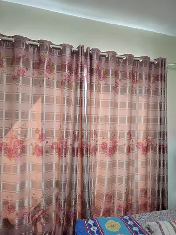 Light pink floral eyelet curtains, ready to hang (pair)