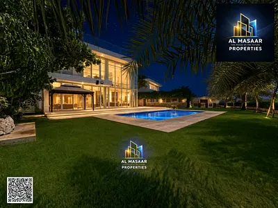 Luxury villa with panoramic views of the lake and golf courses; land area of 14,000 square feet. Pr