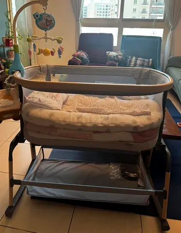 Used 2-in-1 Baby Bassinet with Mobile and Storage Shelf