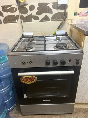 Used 4-Burner Gas Stove with Oven - Good Working Condition