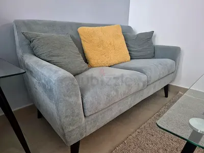 2-seater grey fabric sofa in good condition