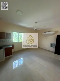 Spacious studio for rent in Al Bustan, Ajman—first-time occupancy. Located on Al Mina Street, near