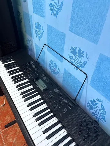 Used Casio 61-Key Electronic Keyboard with Stand and Music Rest