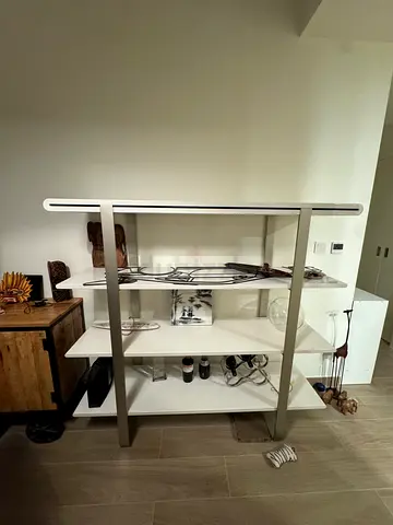 The One  white shelving unit with metal frame — good condition