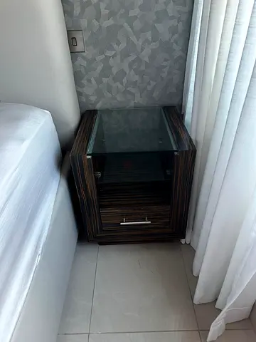 Dark Wood Nightstand with Glass Top and Drawer