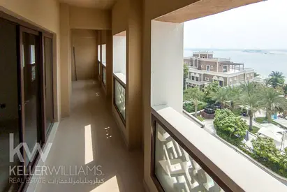 Spacious 2-Bedroom Apartment with Palm and Sea Views | Gated Beach Resort community