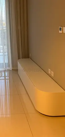 White curved TV cabinet / media console - low profile