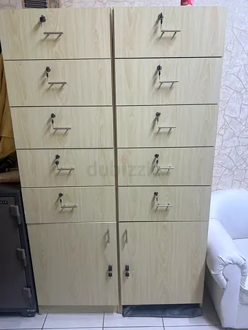 Light wood 12-door wardrobe / storage cabinet — good condition