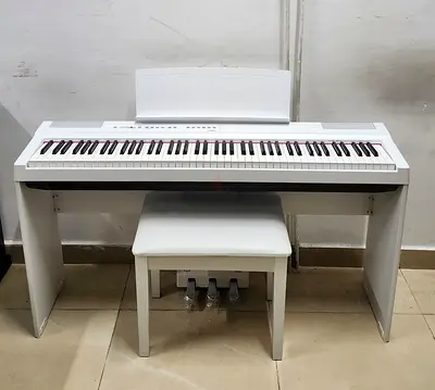 The Yamaha P125WH is a white, compact 88-key digital piano featuring graded hammer action and the