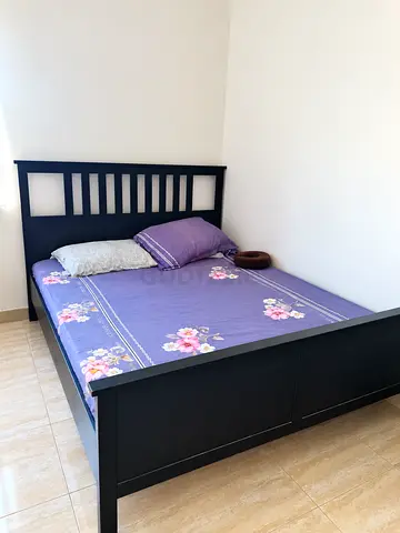 IKEA Solid wood double bed frame in black - good condition