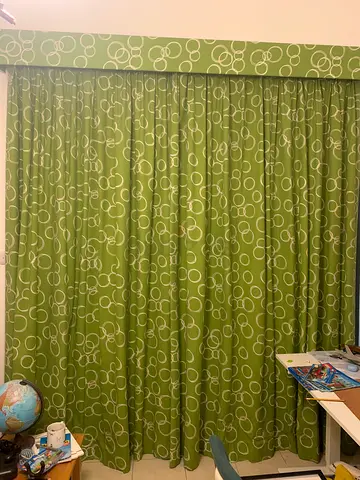 Free set of used curtains with blackout lining.