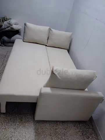Beige Convertible Sofa Bed with Removable Cushions - Good Condition