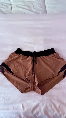 Lulu Lemon brown women's athletic shorts with black trim - size S/M
