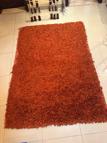 Dark orange rug