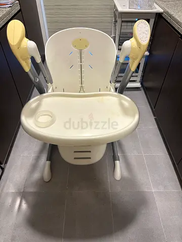 Used baby - missing the cushion - high chair with adjustable tray — clean, good condition