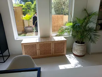 Low wooden storage cabinet/bench with rattan doors