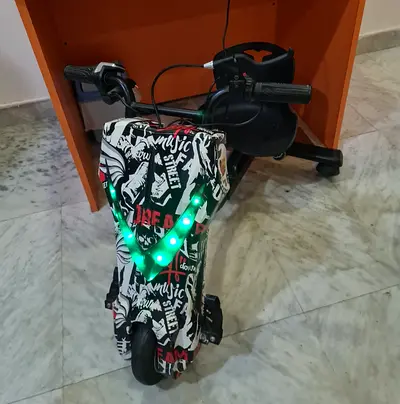 Electric Drift Trike Scooter for Kids with LED Lights - Good Condition