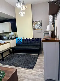 Wooden floor | Furnished 1BR Apartment | Balcony & Community View
