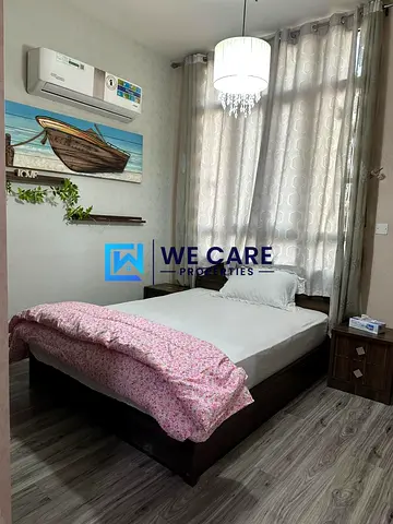 Wooden floor | Furnished 1BR Apartment | Balcony & Community View