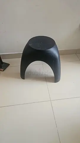 Simple black plastic stool - lightweight and sturdy