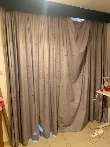 Free set of used curtains with blackout lining.