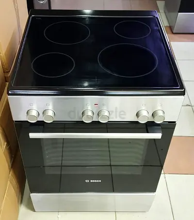 Bosch Brand Electric Cooker 4 Burner New Model Oven With Fan  Excellent Condition Working  Size 60x6