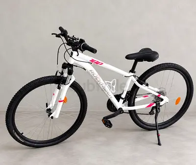 Barely used white/pink Rockrider 27.5″S mountain bike with EXTRA accessories!