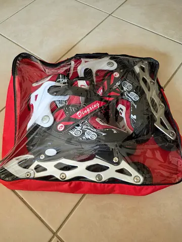 Pair of adult inline rollerblades, size adjustable, lightly used