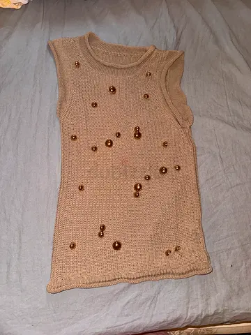 Beige sleeveless knit top with decorative pearl beads, size M