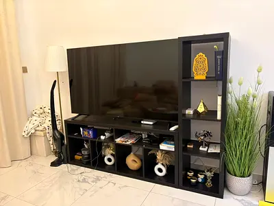 Black TV Stand with Open Shelves and Attached Display Unit - Good Condition