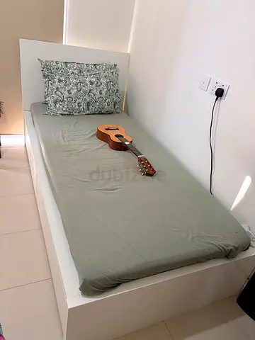 Ikea Single Bed with mattress underneath 2 storage drawers available in perfect condition