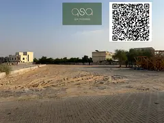 Residential land for sale in Al Zahia, located in a developed area. Price includes all fees