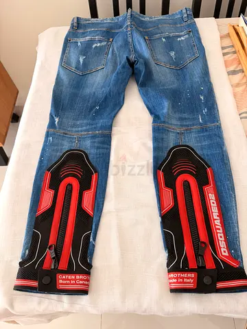 Men's blue distressed jeans - size not labeled, good condition