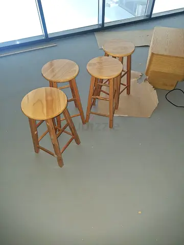 Set of 4 solid wood round bar stools — natural finish