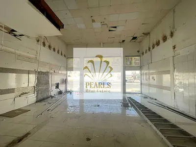 Commercial Showroom for Annual Rent in Ajman Industrial 1, 900 Sq. Ft., Private Bathroom, Central AC, 20 kW 3-Phase Electricity, Parking, AED 80,000