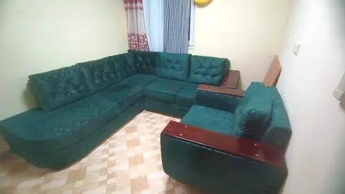 Green L-shaped Fabric Corner Sofa - Good Condition and 2 single Futons