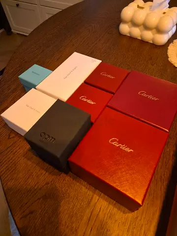Assortment of Cartier and designer jewelry boxes - original packaging