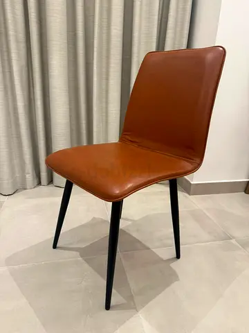 Brown leather dining chair with black legs - single