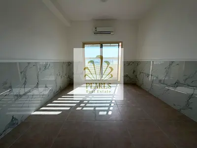 One-bedroom apartment with a living room available for annual rent in Al Rawda 2, Ajman. Located near Layali Beirut Restaurant and Sheikh Ammar Street