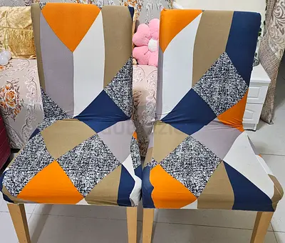 2 Dining Chairs with geometric fabric covers