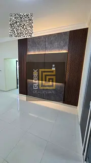 Two-bedroom apartment with a living room for annual rent in Al Jurf 3, Ajman; features spacious area