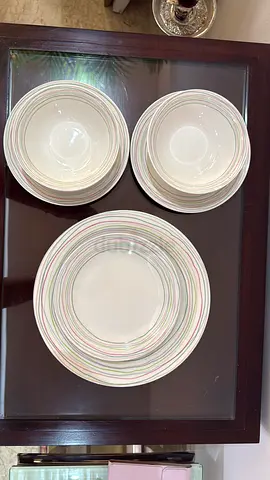 Dinnerware set - 8 plates and bowls, simple striped design (used)