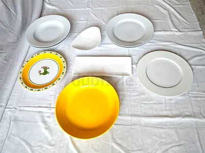 Mixed set of ceramic plates and bowls — 9 pieces, excellent condition - perfect for serving