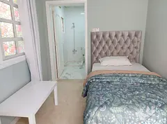 Minimalist White-Themed Room for Rent in Umm Suqeim 2 | Single Occupancy