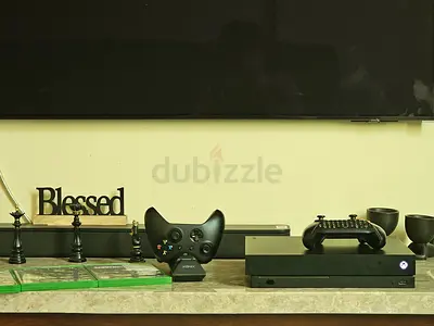 Xbox One X console with 2 Controllers and 3 Games - Mint condition