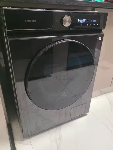 Samsung front-load washing machine  & Dryers in dark grey. It’s about 4 months old, used lightl