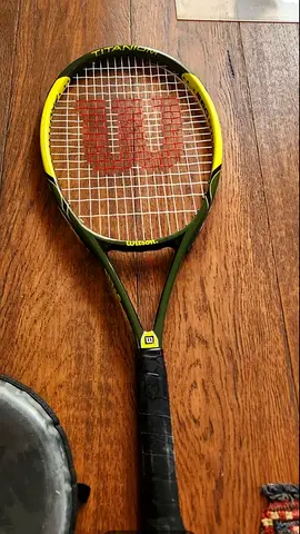 Wilson tennis racket with cover - used