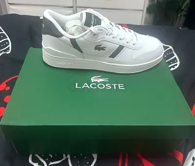 I’m selling a pair of white Lacoste men’s sneakers. They’re never used, in excellent condition . I’m