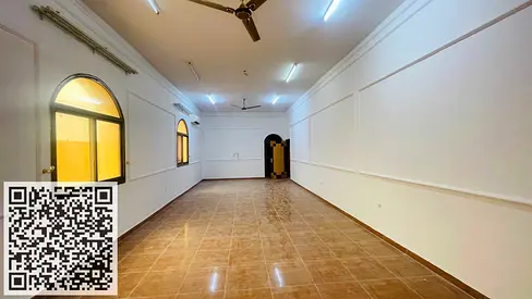 Large residential/commercial villa for rent in Al Muwaihat, featuring an annex and a prime location.
