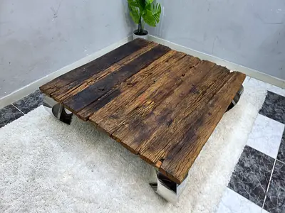 Low reclaimed wood coffee table with metal legs